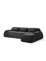 Sofa modulaire noir TOCO Meubles Mia avec trois sections et ottoman, design contemporain en tissu texturé