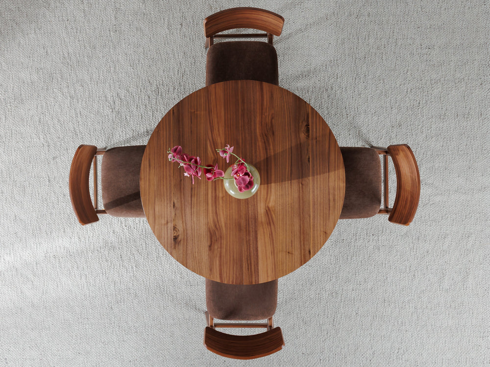 Table à manger ronde extensible Transformer en noyer royal – vue de dessus, mise en situation – Meubles TOCO