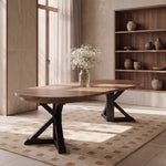 Table ronde Gather châtaignier français, base patina noire dans une salle à manger