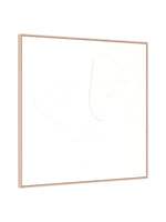 Cadre décoratif Dream I de TOCO Meubles avec un dessin au trait minimaliste d'un visage sur fond beige clair