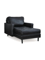 Chaise longue Bryce de TOCO Meubles en cuir noir avec assise capitonnée et pieds modernes