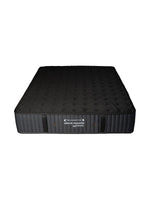 Matelas Dream Shadow Très Grand de TOCO Meubles, réversible, ferme, en mousse haute densité avec capitonnage vertical.