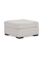Ottoman surdimensionné Koralynn de TOCO Meubles en tissu texturé couleur pierre avec pieds carrés noirs