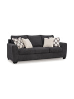 TOCO Meubles Sofa-lit Muna gris foncé, 3 places, avec 4 coussins décoratifs inclus.