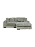 Sofa modulaire Manoa de TOCO Meubles en tissu velours côtelé gris avec méridienne et coussins assortis