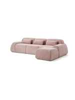 Sofa modulaire rose TOCO Meubles avec trois sections et ottoman assorti au design contemporain et tissu texturé