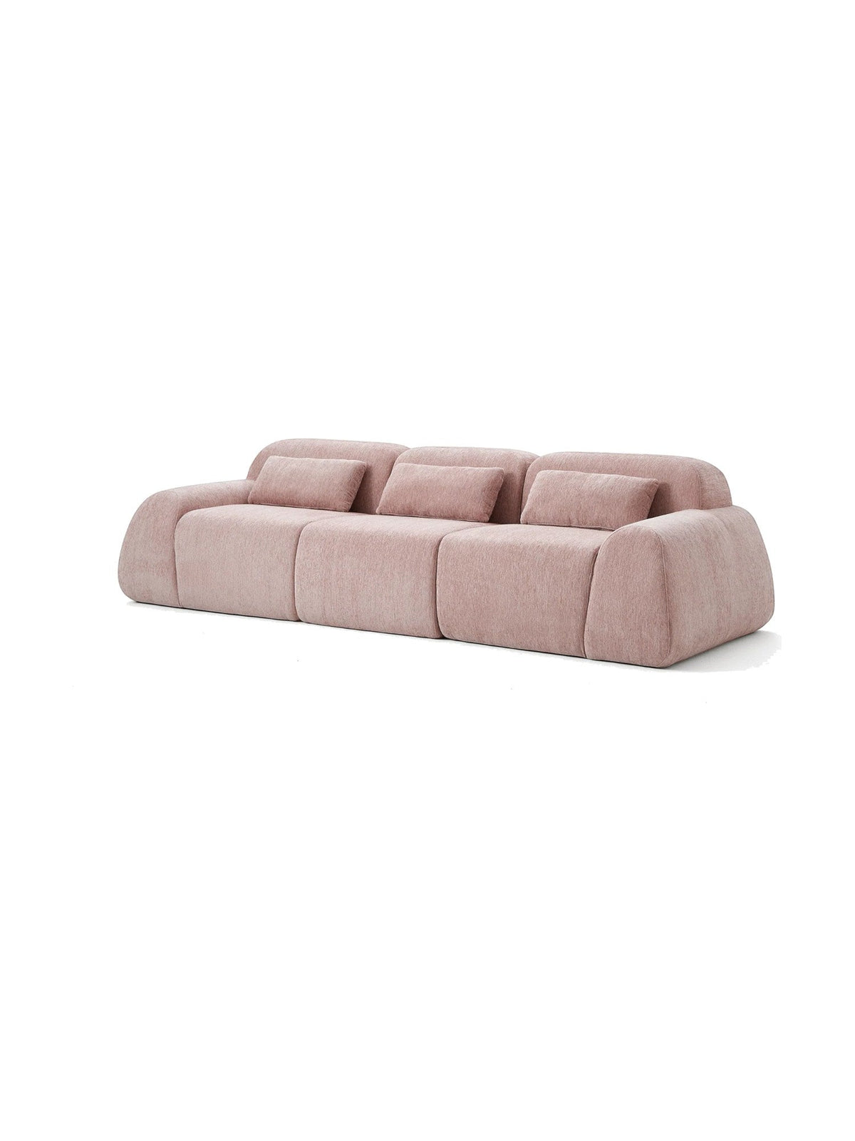 Sofa modulaire Mia de TOCO Meubles en tissu rose avec trois sections et coussins assortis au design contemporain