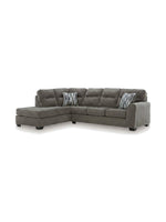 Sofa sectionnel Brutus de TOCO Meubles en tissu gris avec méridienne et coussins décoratifs rayés
