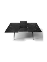 Table de salle à manger extensible Remy TOCO Meubles en marbre noir avec plateau extensible et pieds noirs