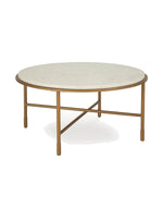 Table basse ronde Alby TOCO Meubles avec plateau en pierre beige et structure en métal doré