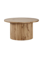 Table basse ronde TOCO Meubles en bois clair avec un pied central cannelé au design contemporain et scandinave