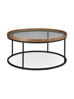 Table de salon ronde Nora par TOCO Meubles avec plateau en verre, bordure en bois naturel et structure en métal noir