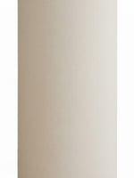 Abat-jour cylindrique en tissu beige texturé de la marque TOCO Meubles pour luminaire élégant
