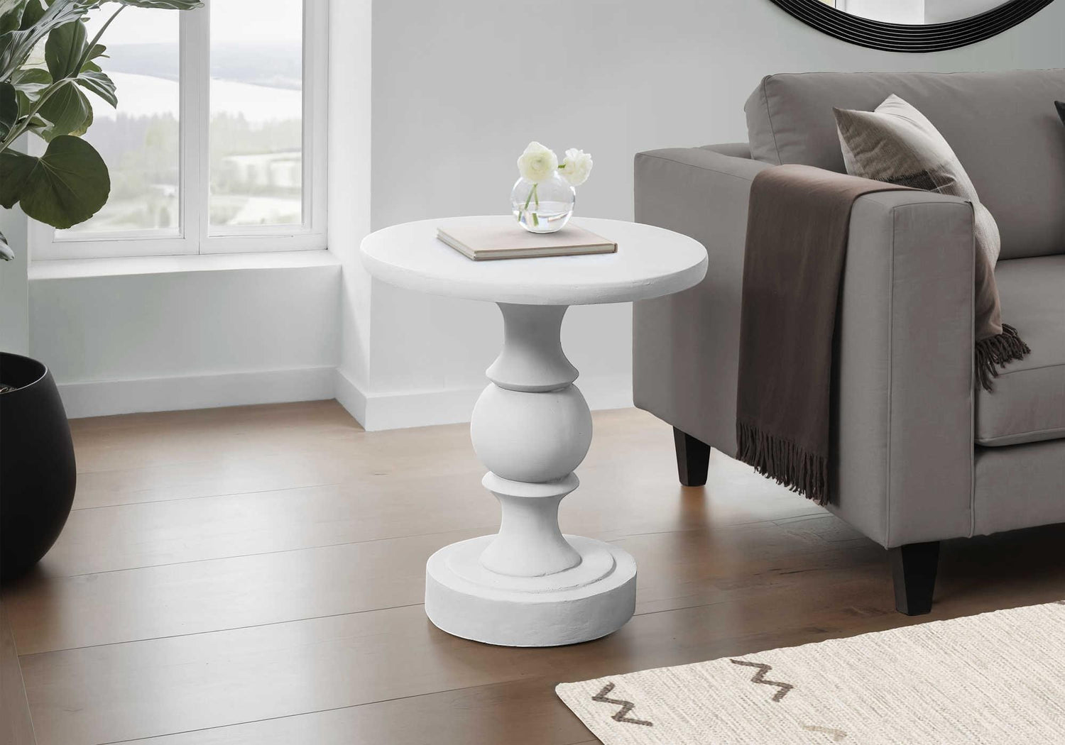 TOCO Meubles Apolo white magnesium side table with pedestal base and round top, suitable for indoor/outdoor use.