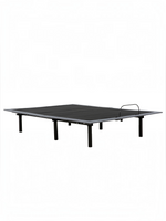 Base de lit électrique Malani de TOCO Meubles avec structure en acier gris foncé et barre de retenue de matelas