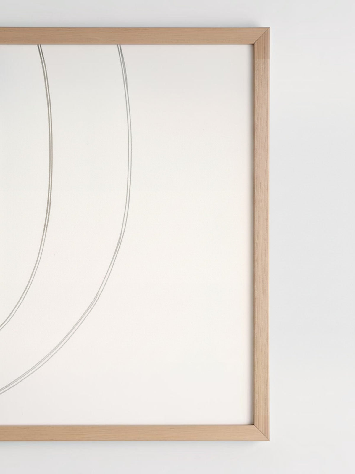 Cadre décoratif Dream II de TOCO Meubles avec un cadre en bois clair et une illustration minimaliste à lignes fines