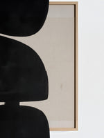 Cadre décoratif TOCO Meubles Pillars I avec motif géométrique noir abstrait sur fond beige et cadre en bois clair