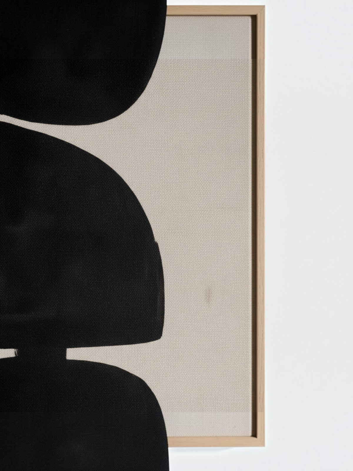 Cadre décoratif TOCO Meubles Pillars I avec motif géométrique noir abstrait sur fond beige et cadre en bois clair