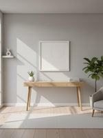 Cadre décoratif Dream II de TOCO Meubles au design épuré et minimaliste accroché au-dessus d'une console en bois.