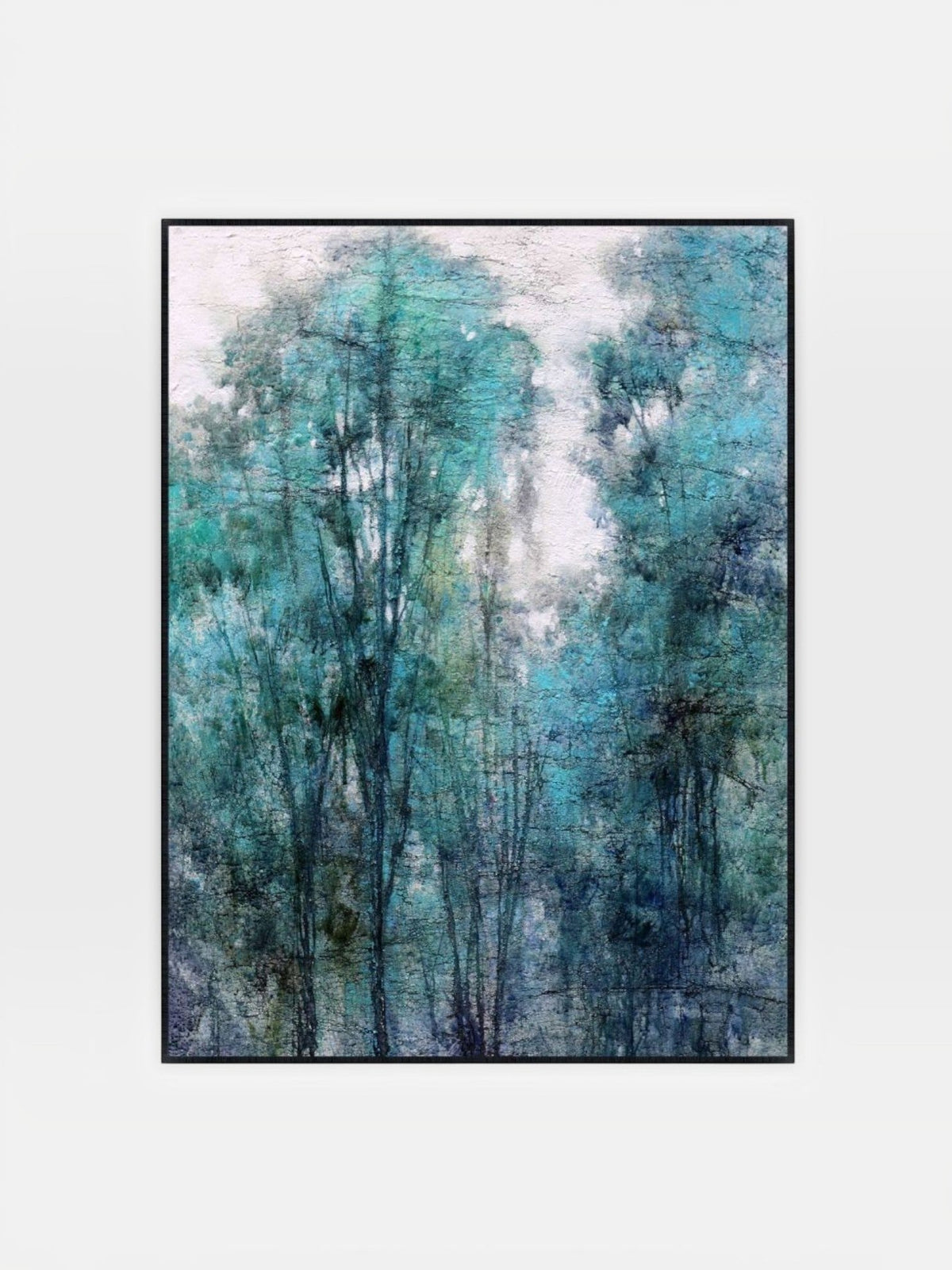 Cadre décoratif TOCO Meubles représentant une forêt abstraite aux tons bleu et vert avec un cadre noir élégant