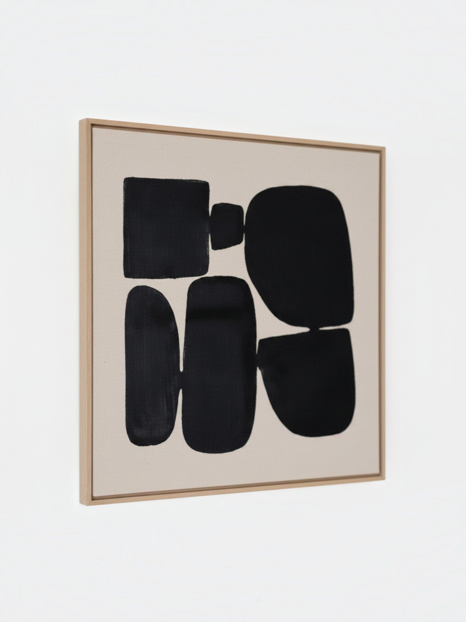 Cadre décoratif TOCO Meubles Pillars II avec formes géométriques abstraites noires sur fond beige et cadre en bois