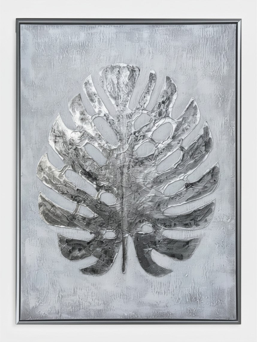 Cadre décoratif TOCO Meubles Paradise Palm II avec motif de feuille de palmier argentée sur fond gris texturé