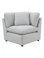 TOCO Meubles - Canapé d'angle modulaire gris clair en tissu texturé avec coussins moelleux et accoudoirs inclinés.