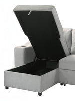 TOCO Meubles Zena convertible sofa in light grey fabric, with open storage compartment and cup holder.