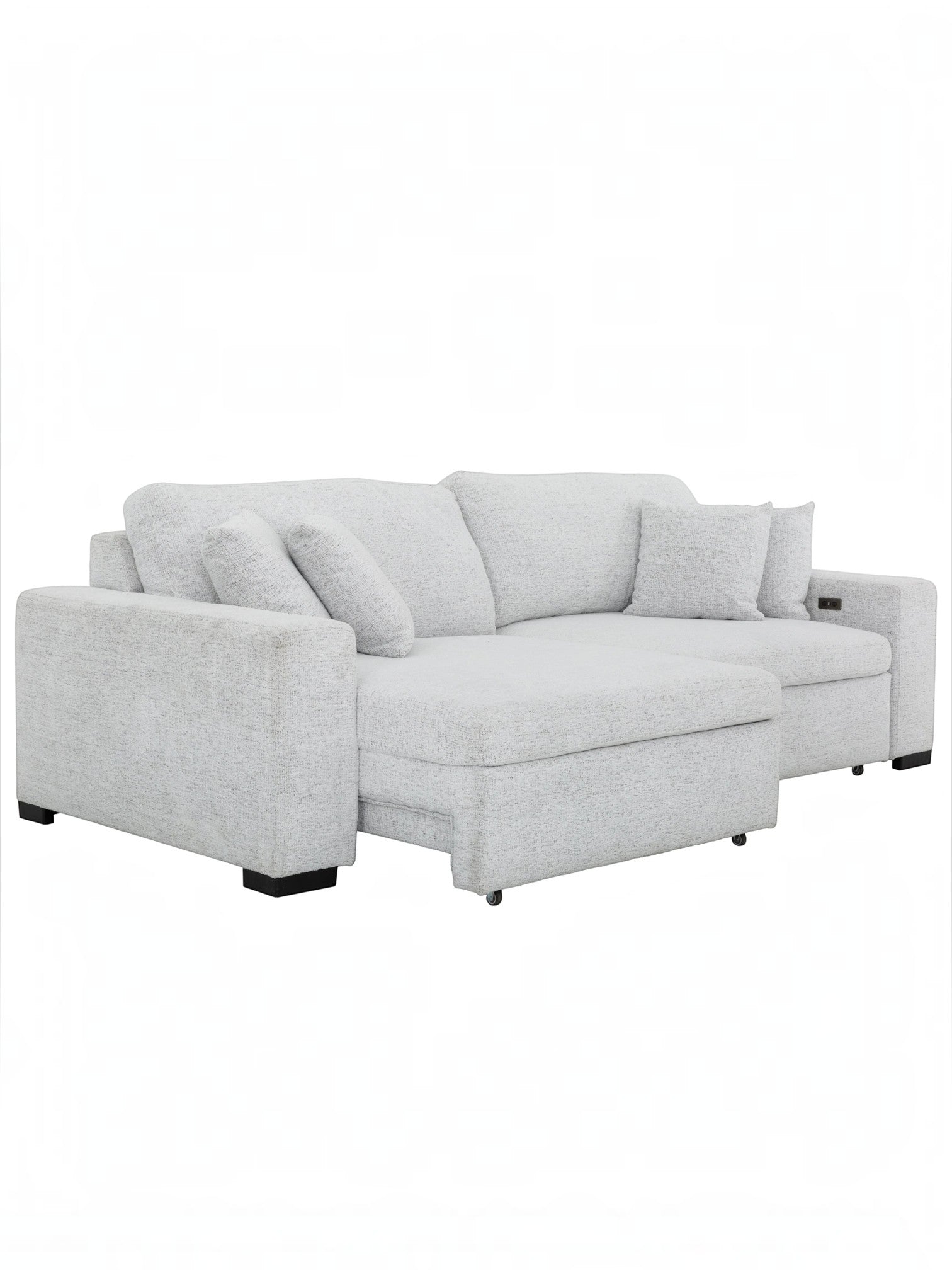 Canapé convertible Sacha de TOCO Meubles en tissu gris pâle avec méridienne et coussins assortis