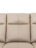 Canapé inclinable Charlie en cuir beige de TOCO Meubles, assise confortable et pratique pour un salon.
