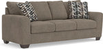Canapé 3 places TOCO Meubles Kaya en tissu texturé marron avec coussins décoratifs géométriques