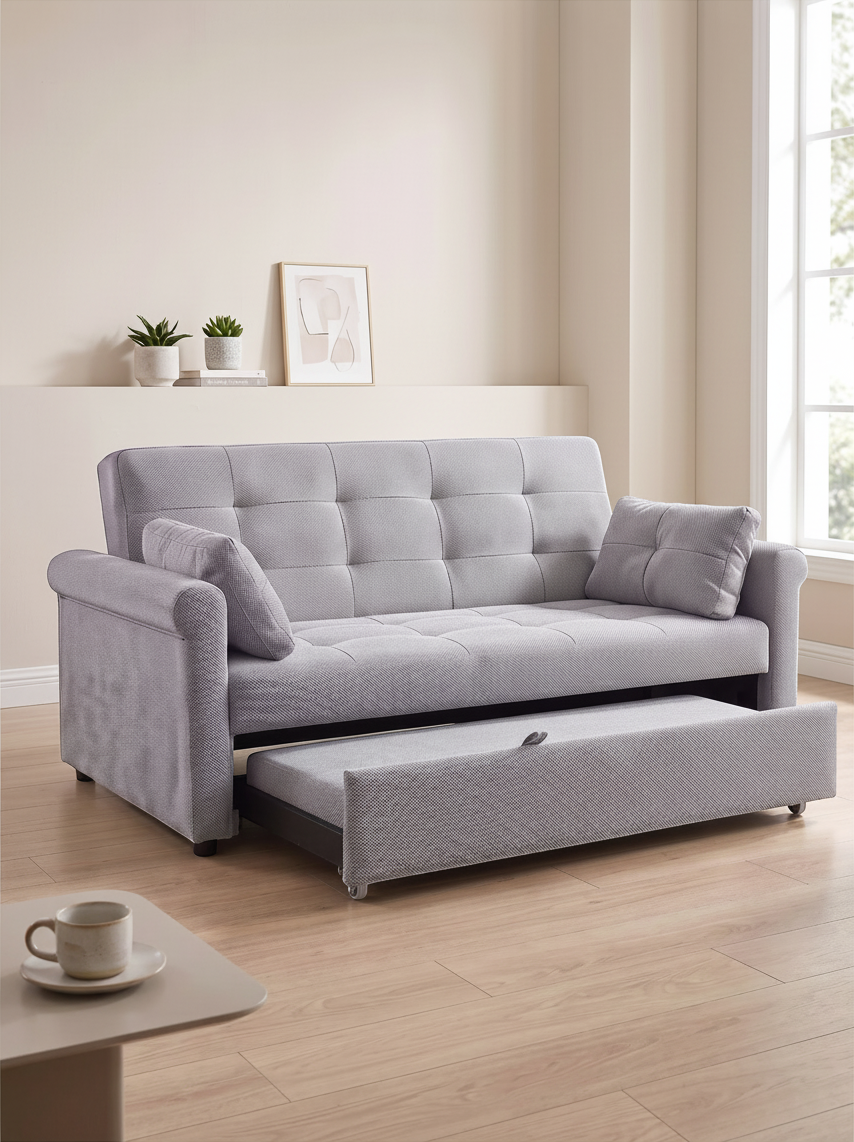 Canapé-lit convertible gris TOCO Meubles avec assise capitonnée et tiroir de couchage intégré dans un salon moderne