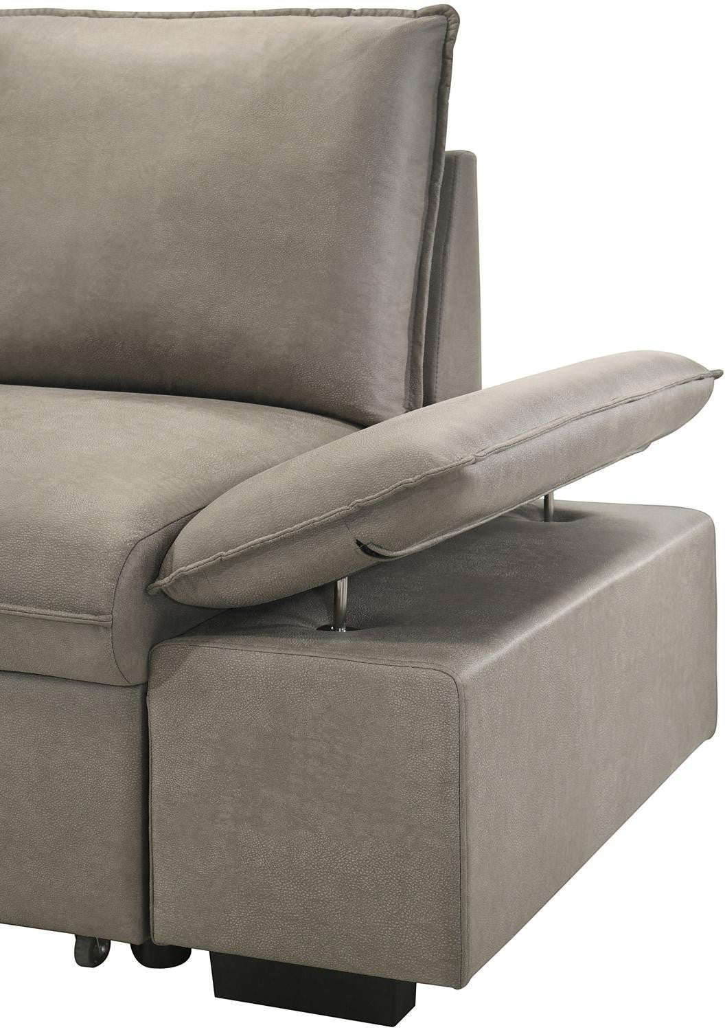 Canapé-lit Nia gris en tissu texturé de TOCO Meubles avec accoudoir réglable et porte-gobelet intégré.