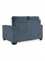 Toco Meubles Canapé-lit Jabari 2 places bleu marine en tissu texturé, design moderne avec pieds carrés noirs.