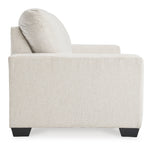 TOCO Meubles Canapé-lit Jabari 3 places crème texturé avec coussin moelleux et pieds noirs discrets.