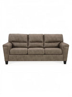 Canapé-lit Kairo TOCO Meubles aspect cuir marron, 3 places, coutures contrastantes, pieds noirs.