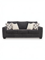 Canapé-lit Muna TOCO Meubles anthracite en tissu, avec 4 coussins décoratifs, design moderne et confortable.