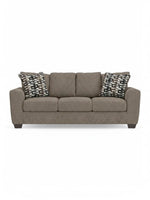 Canapé-lit TOCO Meubles Kaya en tissu taupe texturé avec coussins décoratifs à motifs géométriques