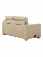 Vue arrière du canapé-lit sectionnel Zola beige de TOCO Meubles avec pieds en bois et design épuré