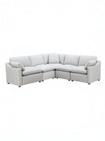 TOCO Meubles Canapé modulaire Marine en tissu gris clair, 5 places, avec coussins moelleux et accoudoirs inclinés.