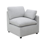 TOCO Meubles Canapé modulaire Marine gris clair en tissu texturé avec coussins moelleux et accoudoirs inclinés.
