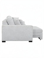 Canapé convertible Sacha de TOCO Meubles en tissu gris pâle avec assise extensible et pieds noirs, vue de profil.