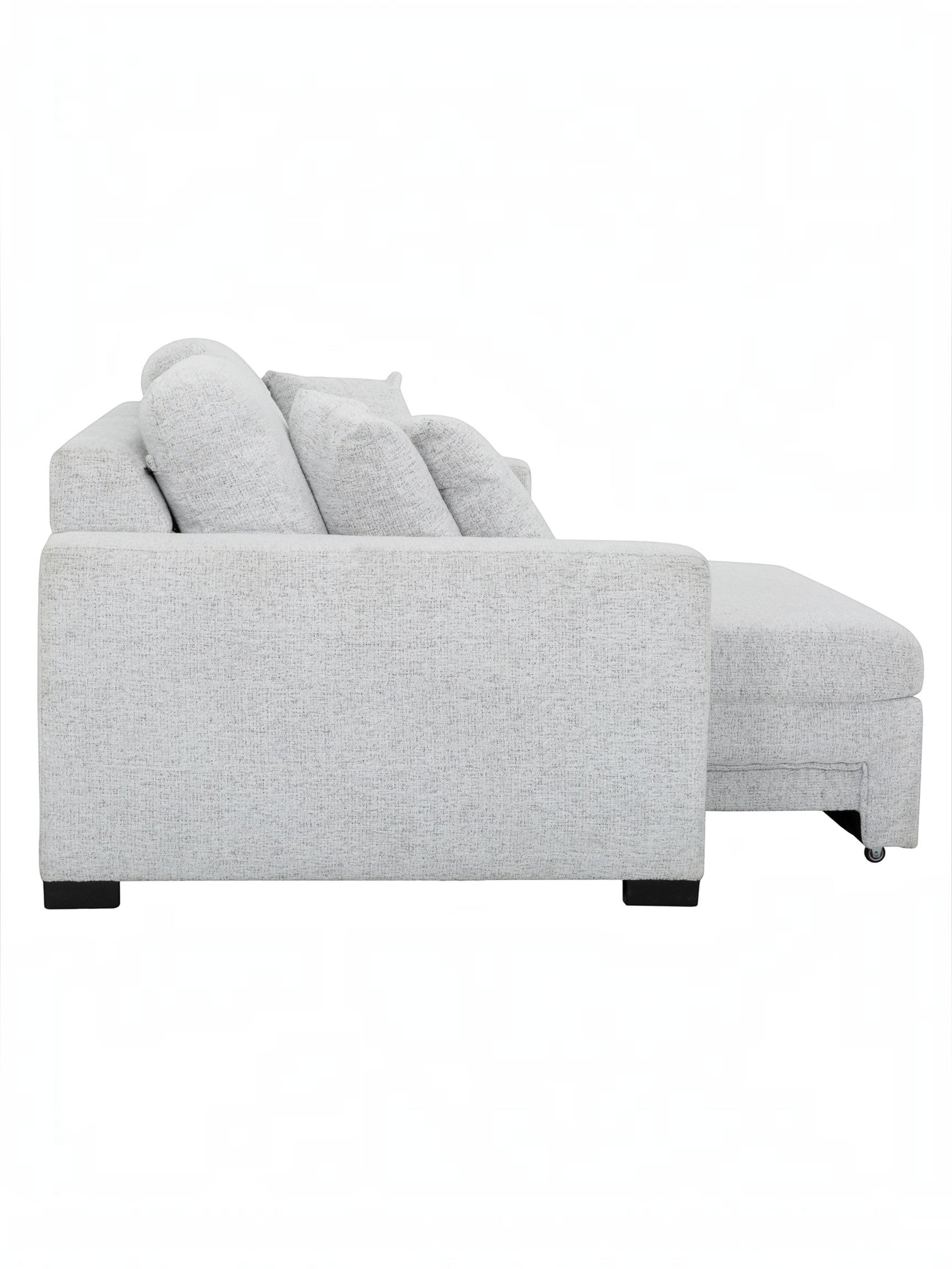 Canapé convertible Sacha de TOCO Meubles en tissu gris pâle avec assise extensible et pieds noirs, vue de profil.