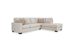 TOCO Meubles Canapé sectionnel Toscana beige en tissu avec coussins décoratifs géométriques.