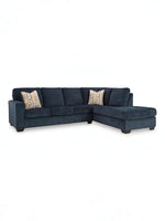 TOCO Meubles Sofa sectionnel Toscana bleu marine en tissu avec coussins décoratifs géométriques.