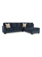 TOCO Meubles Sofa sectionnel Toscana bleu marine en tissu avec coussins décoratifs géométriques.