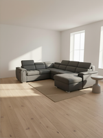 Canapé sectionnel-lit gris moderne de TOCO Meubles dans un salon lumineux avec parquet en bois clair