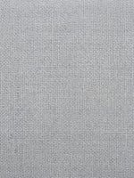 Gros plan sur le tissu gris texturé du canapé Simone de TOCO Meubles