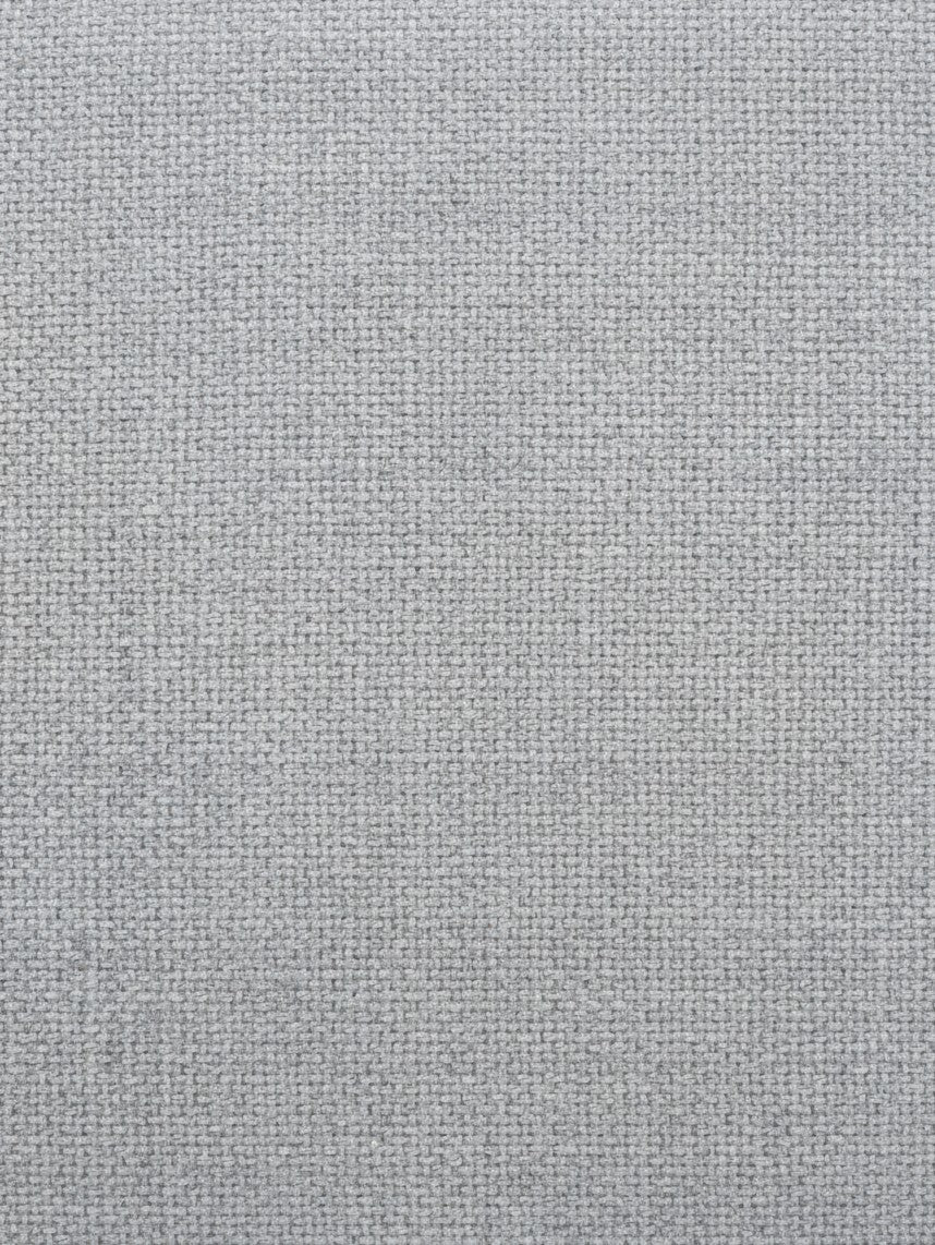 Gros plan sur le tissu gris texturé du canapé Simone de TOCO Meubles