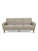 Canapé Tano beige en tissu de TOCO Meubles, 3 places, pieds en bois obliques, style moderne.